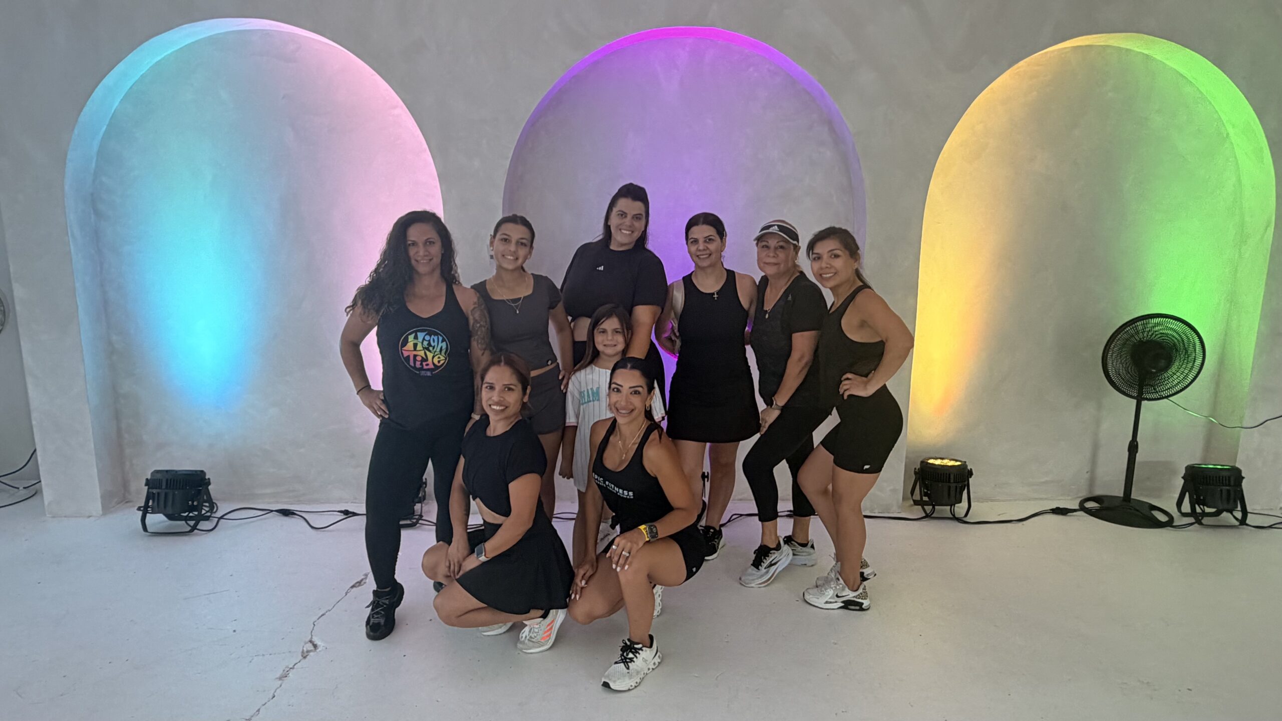 Outdoor workout community class with Epic Fitness staff and members
