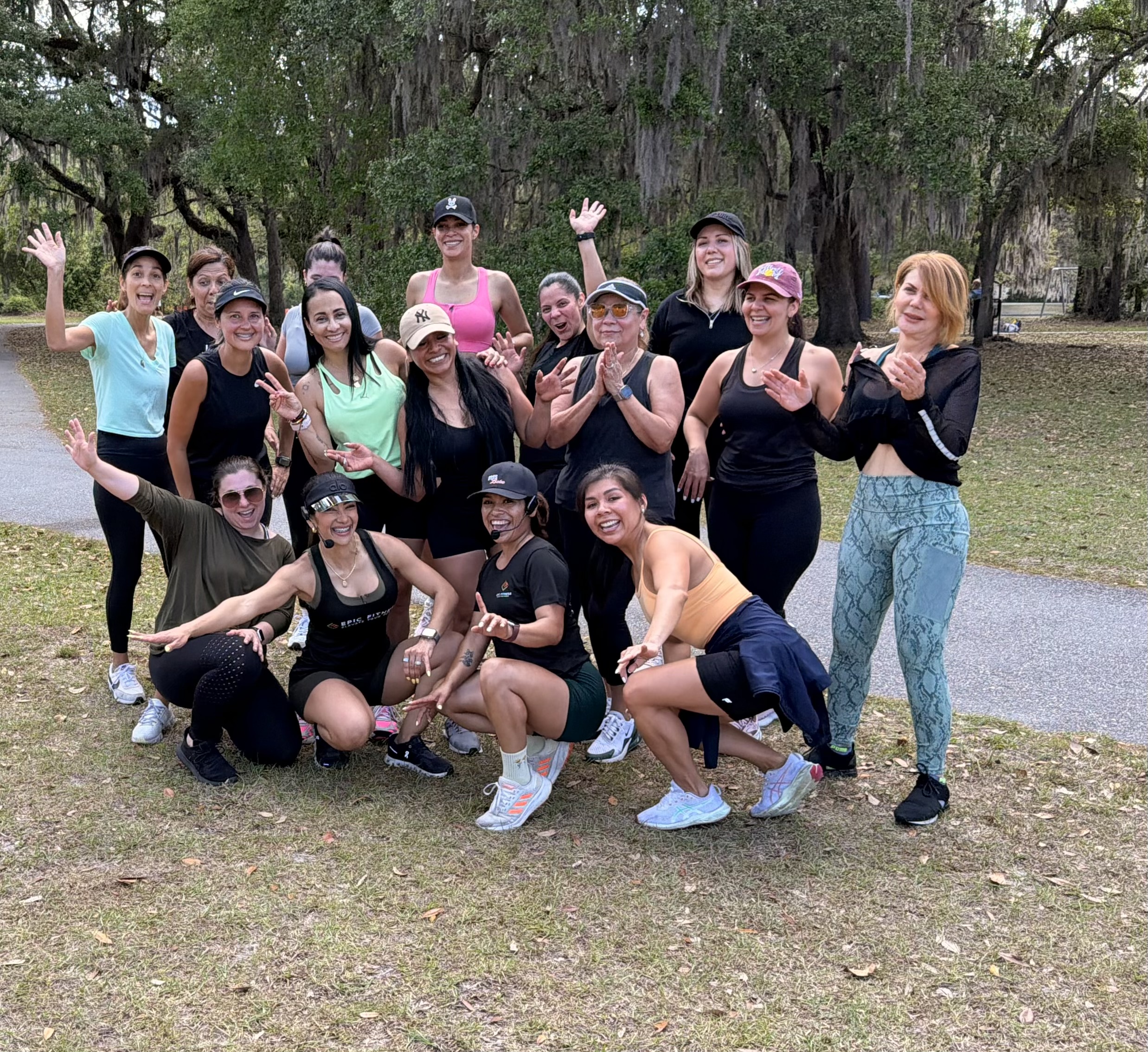 Epic Fitness staff and members celebrating community workout